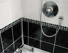 photograph of bathroom tiled by Versa Tile Ceramics